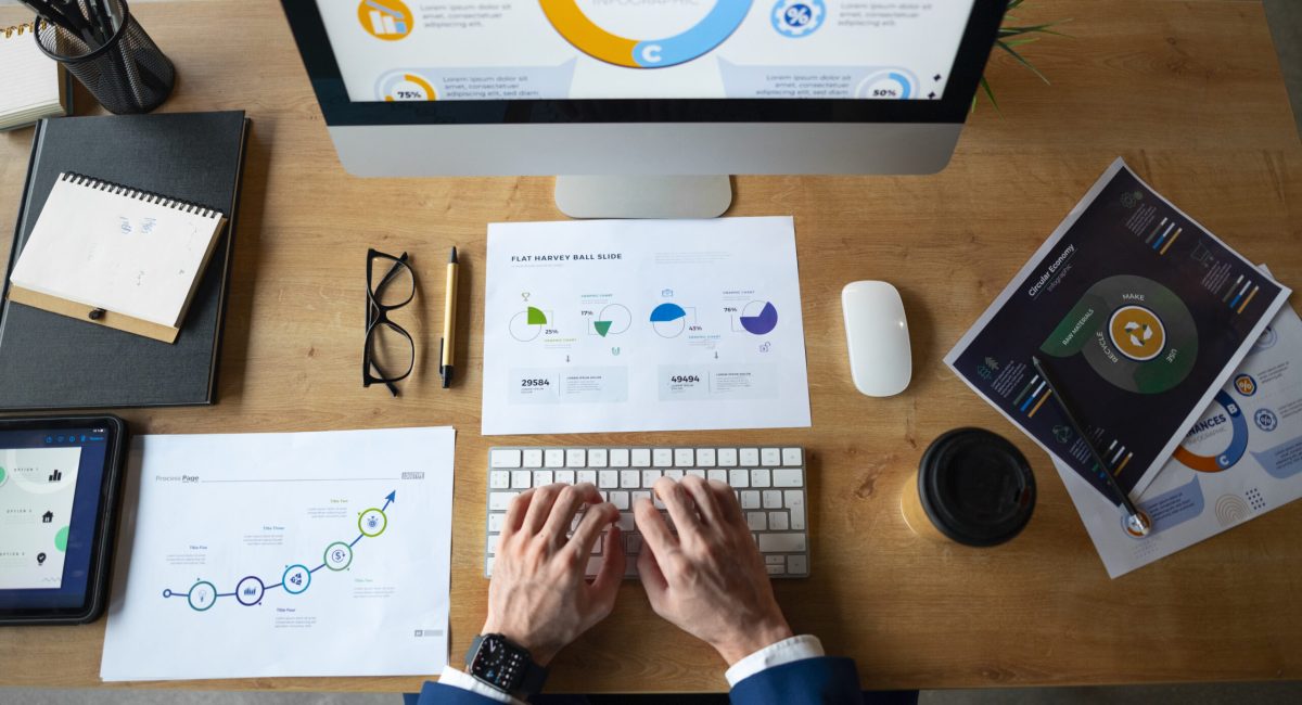 person-office-analyzing-checking-finance-graphs